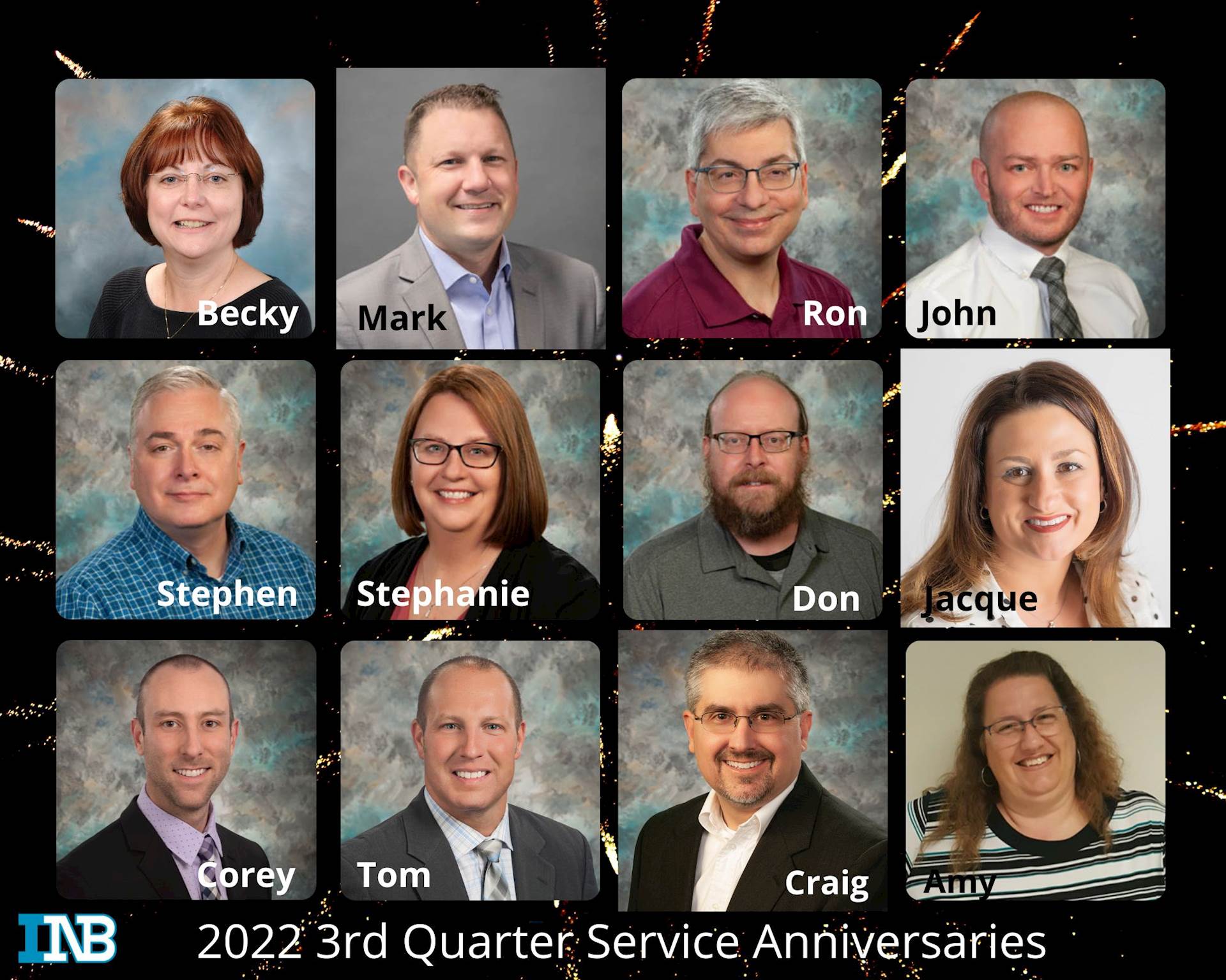 12 people celebrating service anniversaries