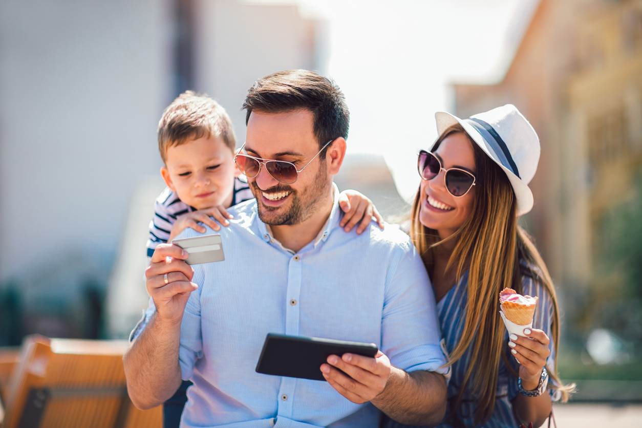 Father, mother and son smiling