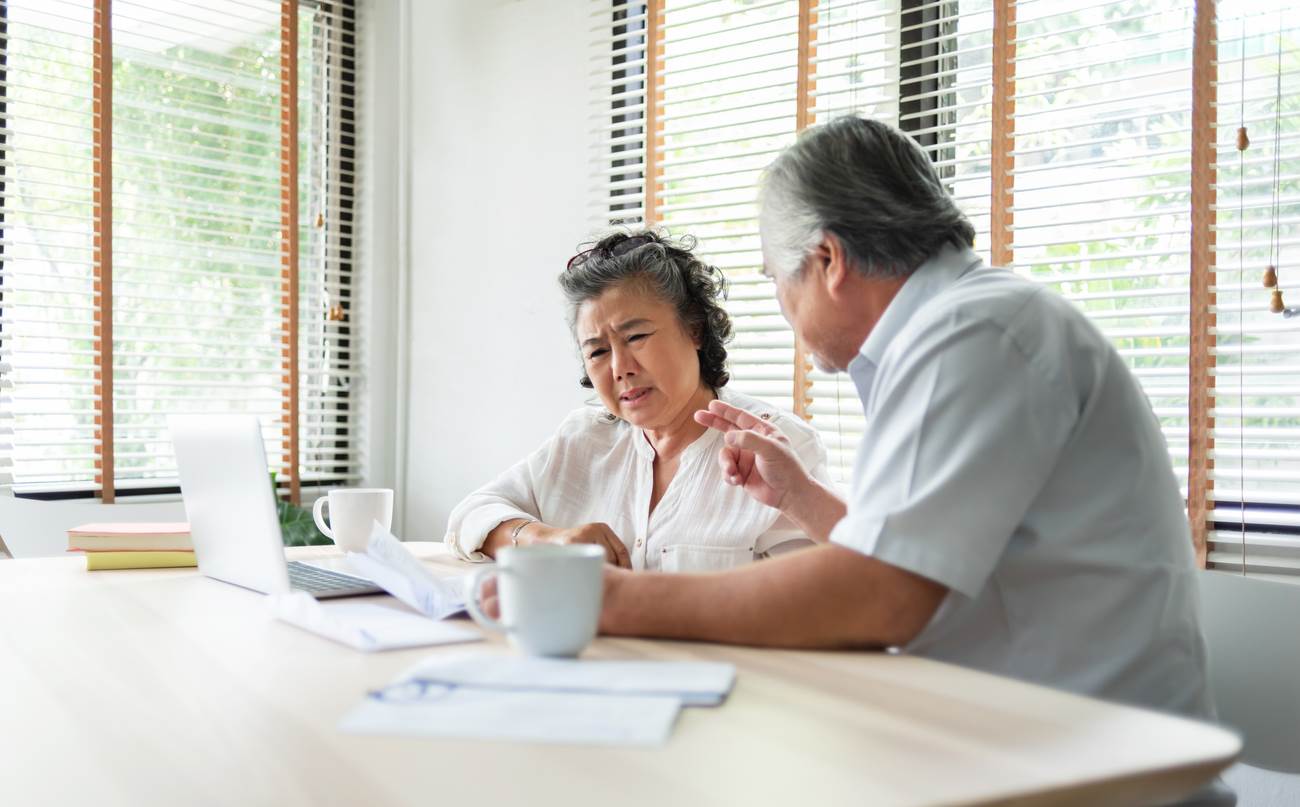 Older couple discussing finances