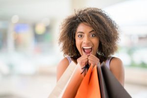 excited woman shopping