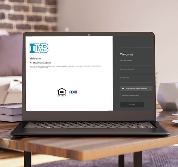 Open laptop showing the INB new account web form