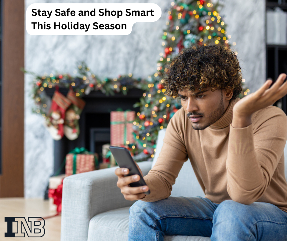 a man looks at his phone like something is wrong