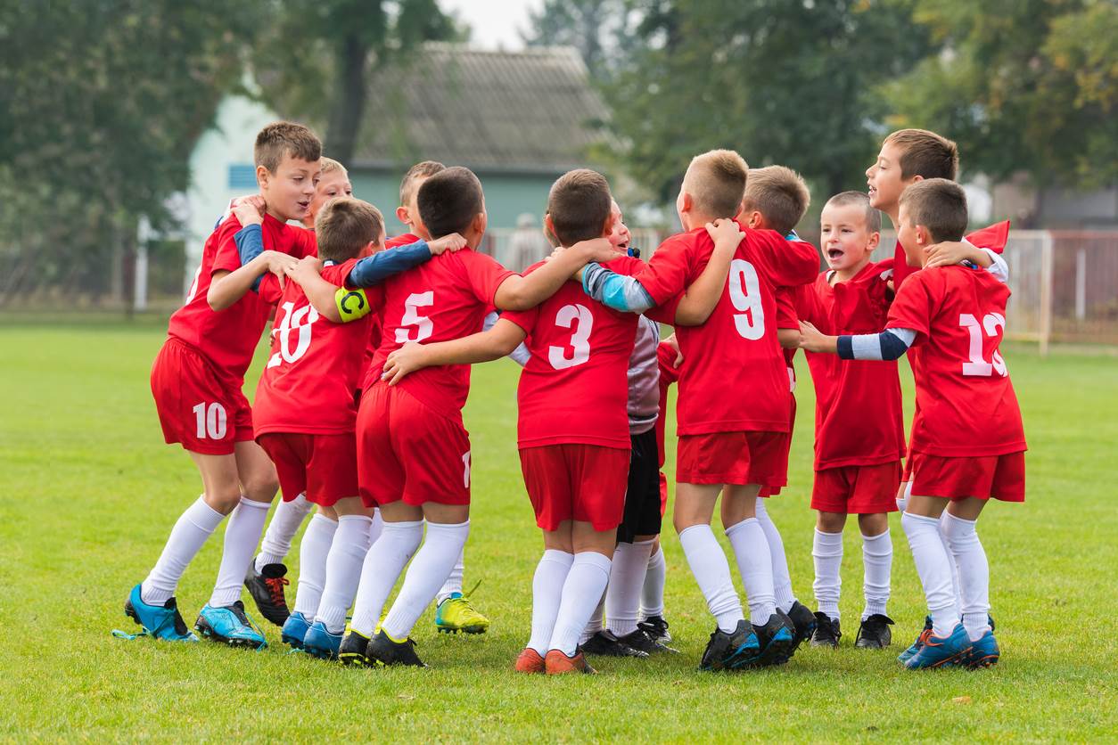 Group of kids playing soccer