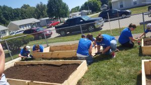 group building the forth of four beds