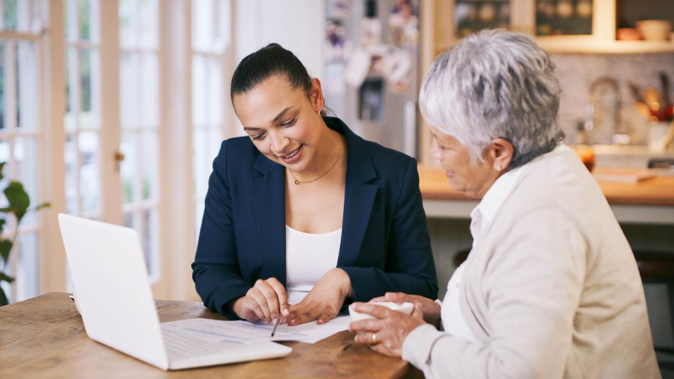 Two women looking over financials