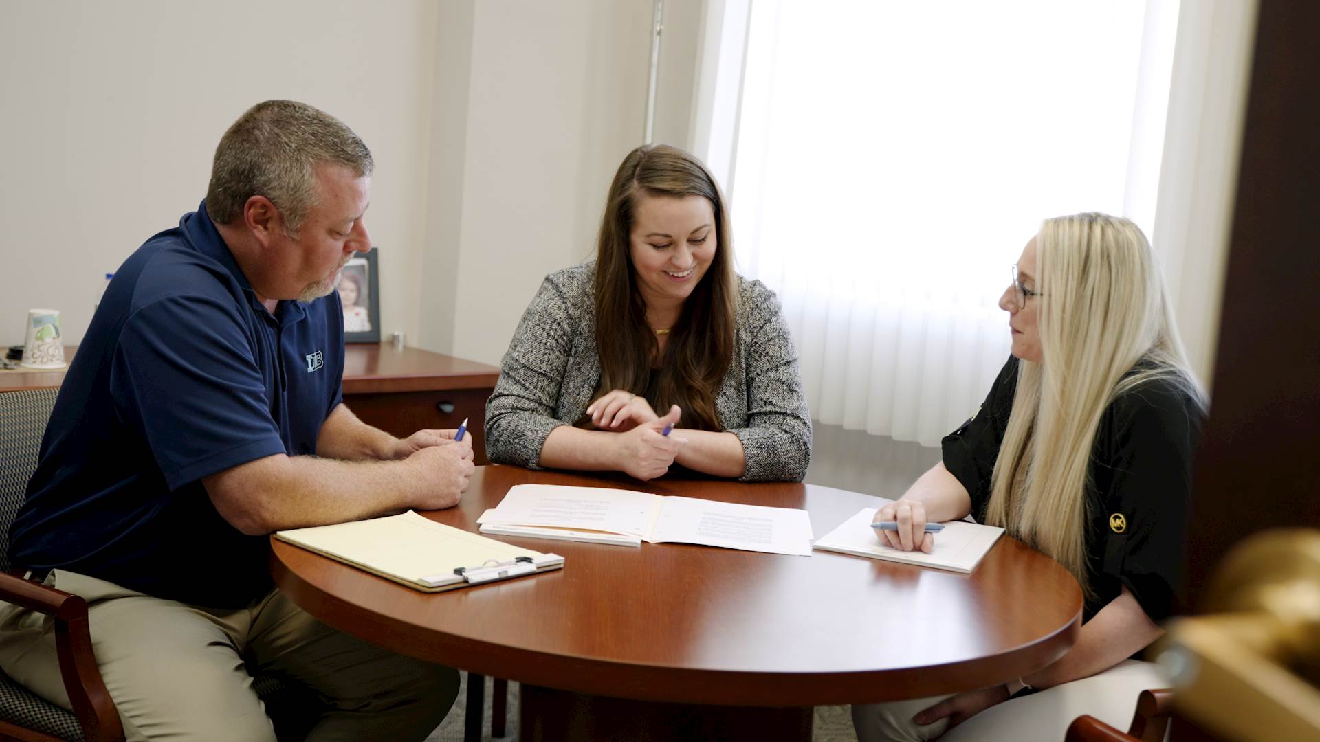 Three people at a table