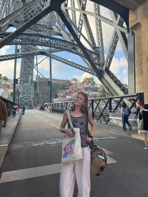 Lily Randolph standing on a bridge