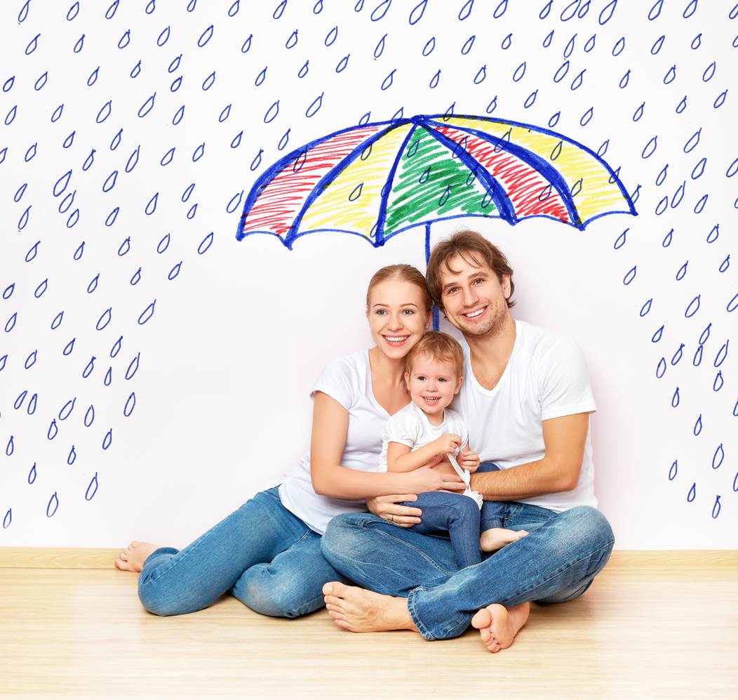 A familyn under an umbrella