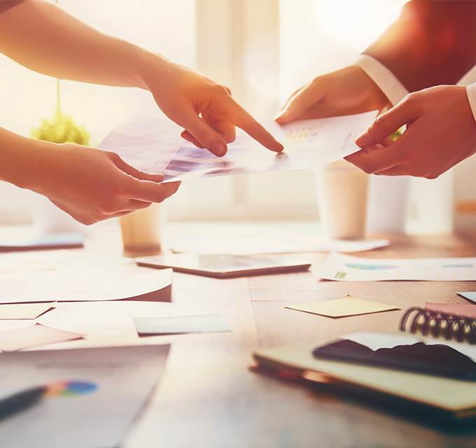 Two business people reviewing documents